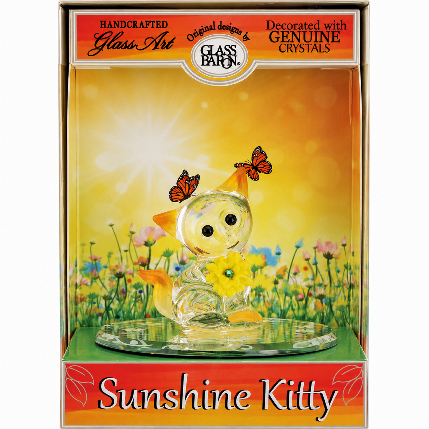 Handcrafted Sunshine Kitty glass cat figurine holding a yellow flower in a decorative keepsake display box.